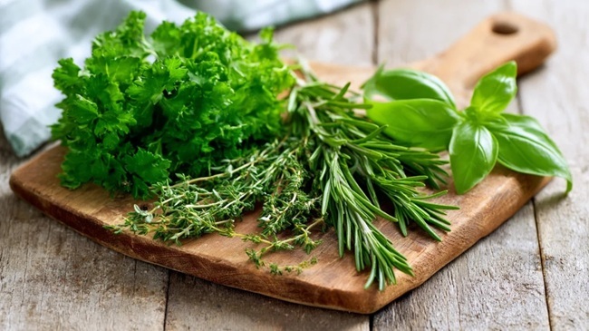 cutting board with basil, thyme and parsley cutting board with basil, thyme and parsley